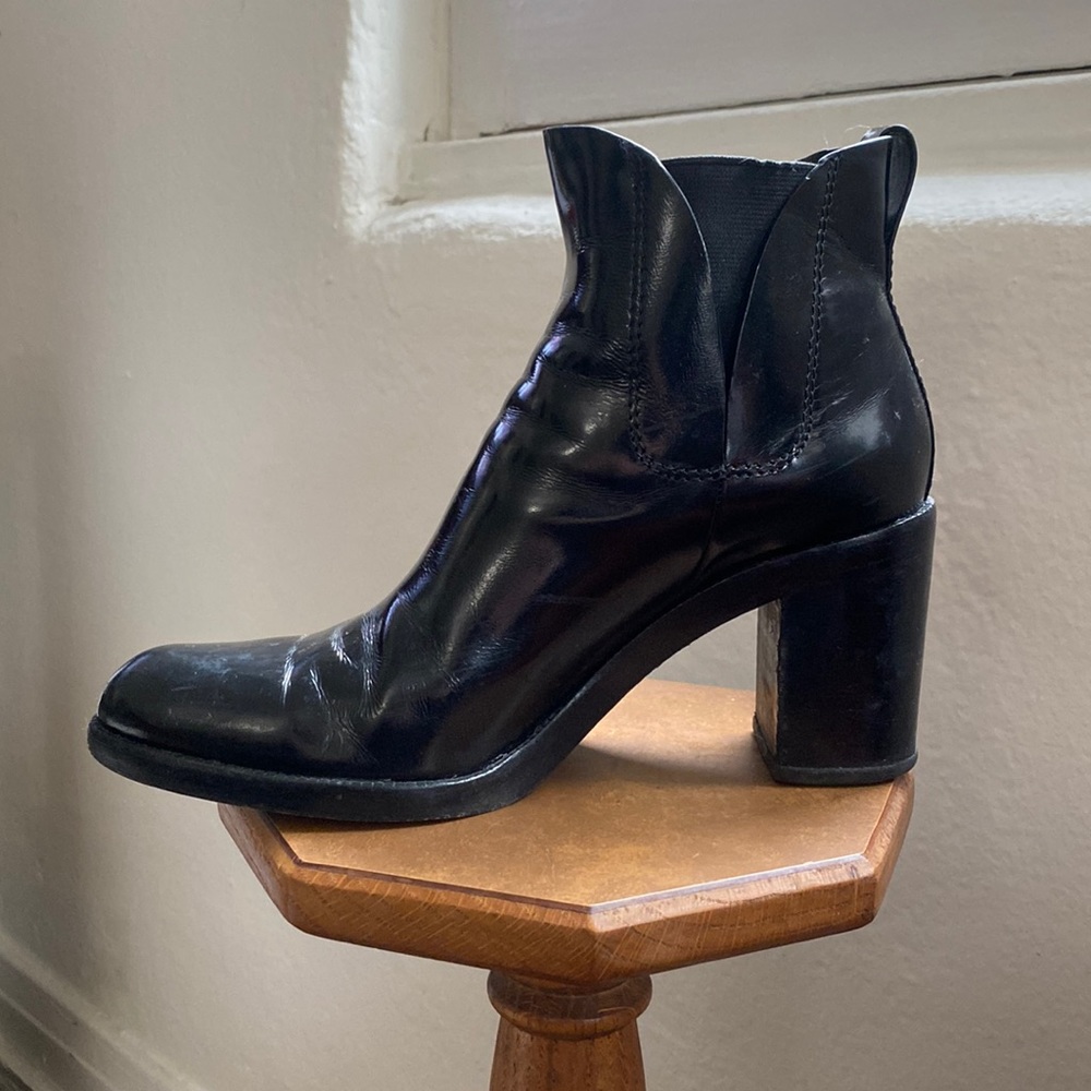 Alexander Wang patent black leather pull-on boots.
